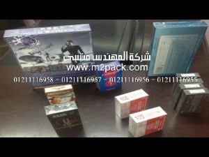 ماكينة موديل 801 من المهندس منسي تغلف السي دي و علب الأدوية نصف اتوماتيك